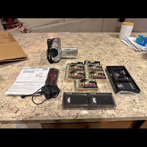 JVC Gray Camcorder with VHS-C Tapes